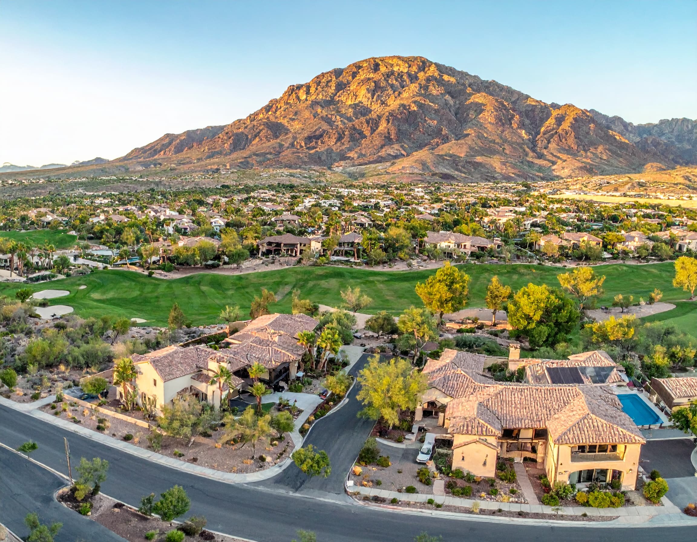 Summerlin Las Vegas homes beside a golf course and Red Rock backdrop